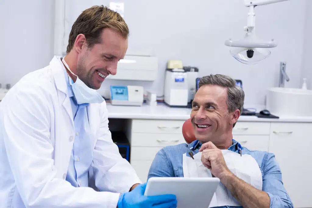 Orthodontist explaining braces treatment options in Gallup NM